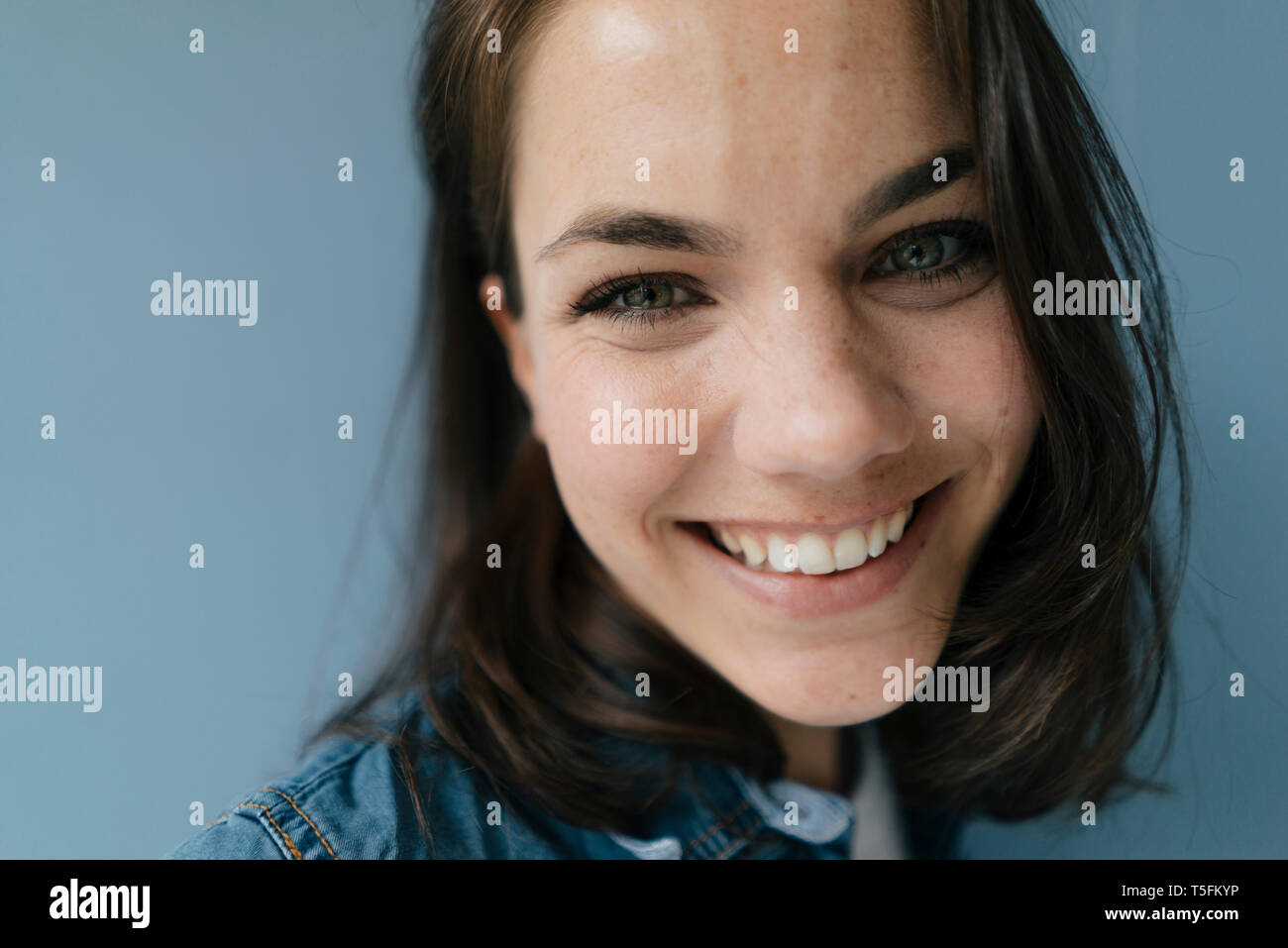 Portrait of a woman, smiling happily Stock Photo
