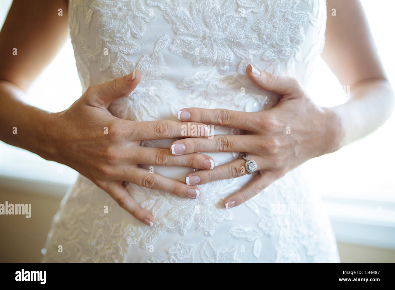 Wedding day dress/ hands Stock Photo - Alamy