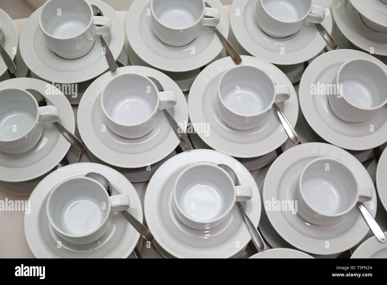 Clean Empty White Ceramic Coffee Cups With Spoons Stock Photo Alamy