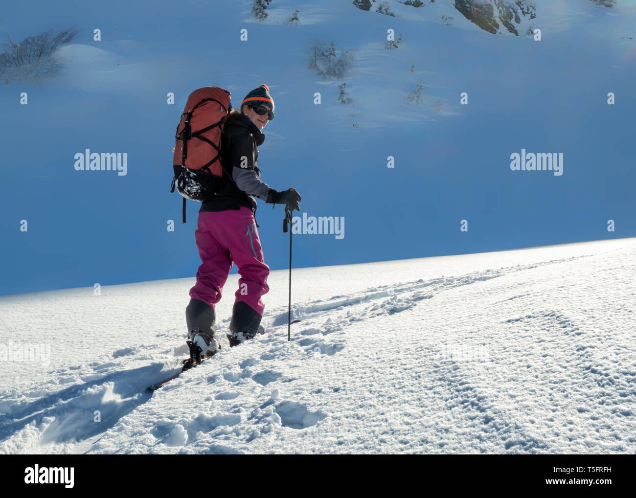 Switzerland, Bagnes, Cabane Marcel Brunet, Mont Rogneux, woman ski touring in the mountains Stock Photo