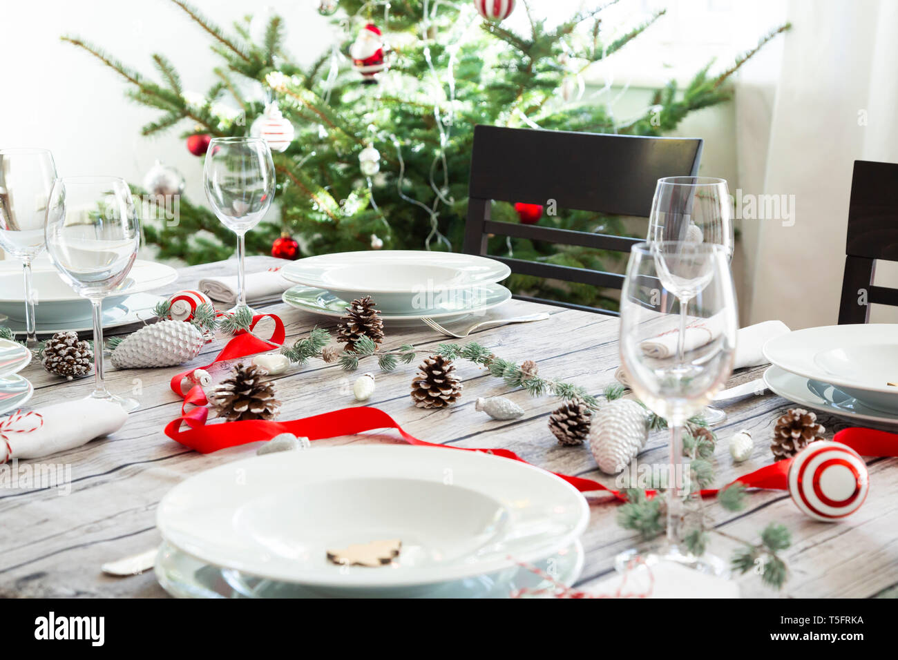 Laid table with Christmas decoration Stock Photo