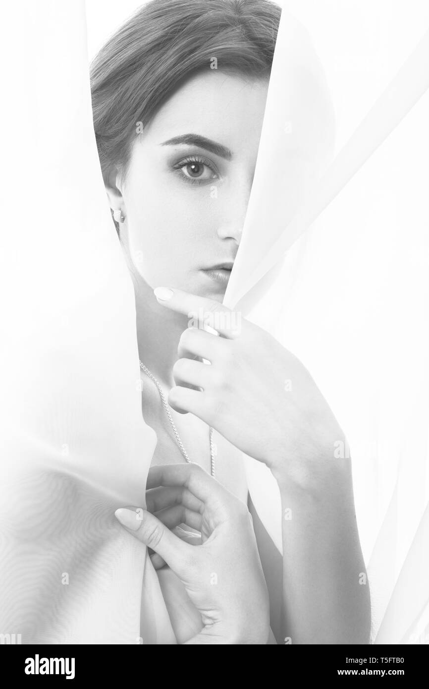 naked sensual woman with veil on white background, cover her body