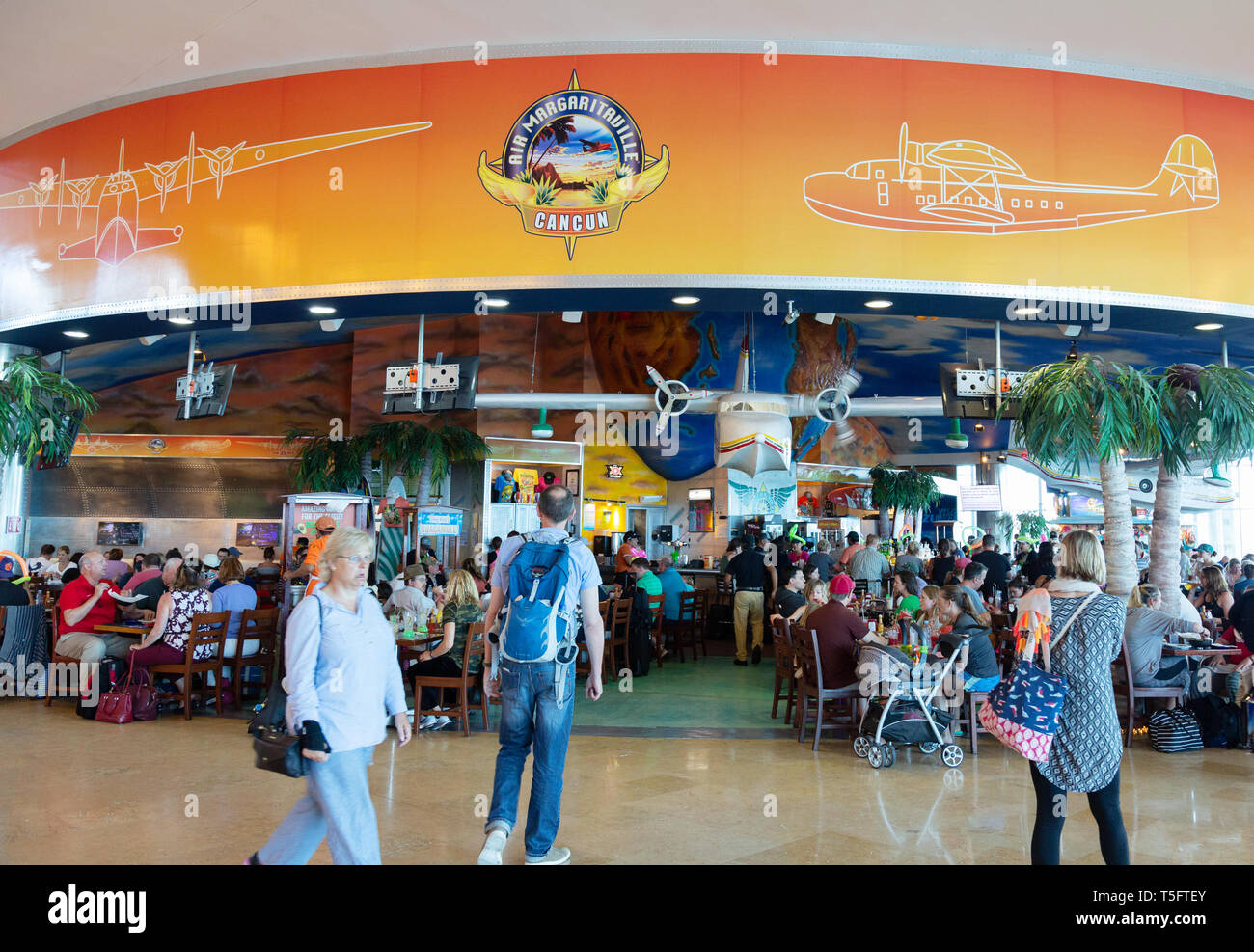 People at the Air Margaritaville restaurant, departures terminal 3, Cancun airport Mexico Stock Photo