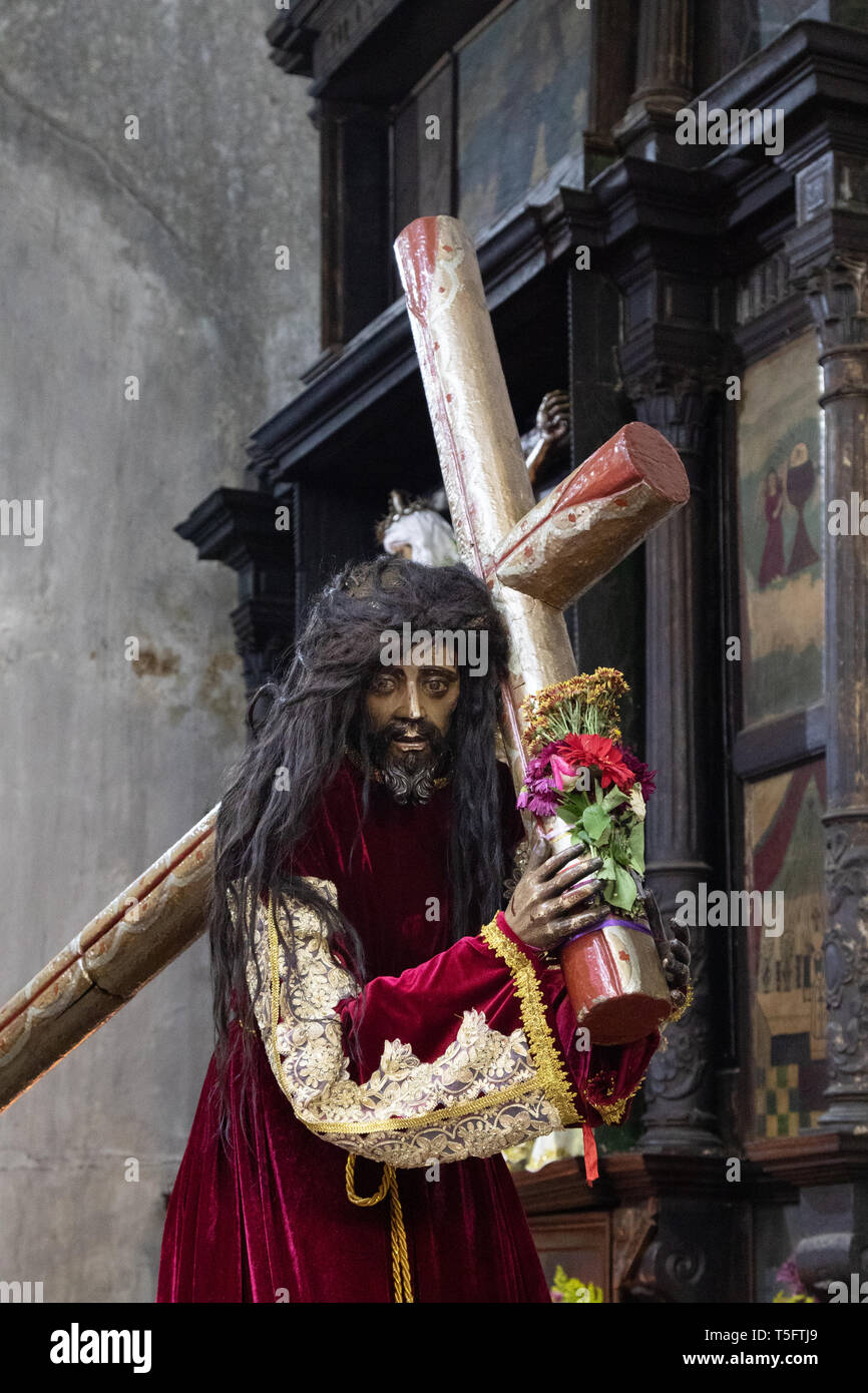Wooden statue of Jesus carrying cross, in St James the Apostle