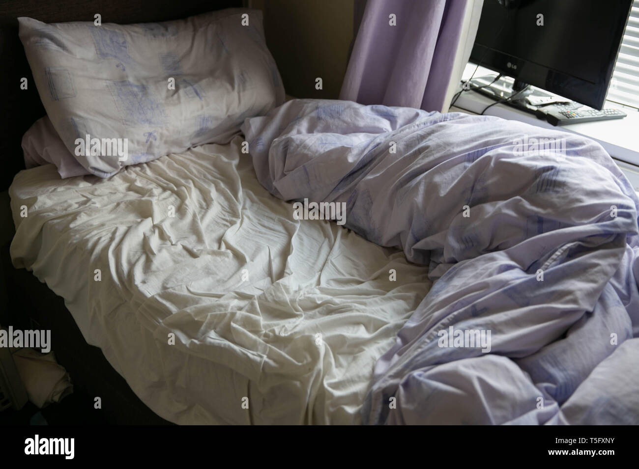 Bed After A Restless Sleep Stock Photo