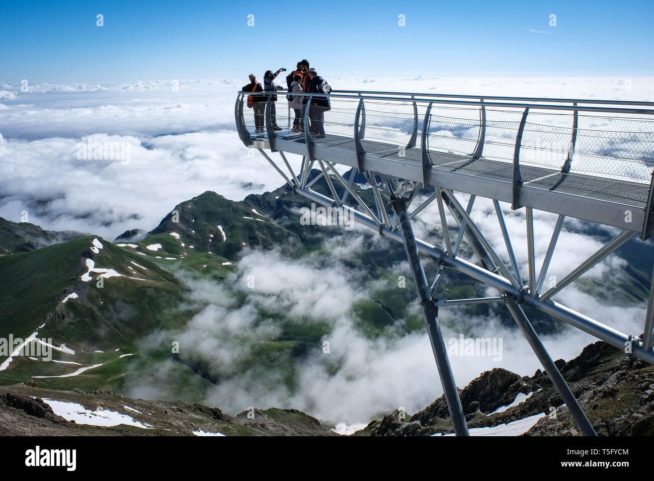 La Mongie France July 06 Tourists Looking At The View From The Ponton Dans Le Ciel Of The Pic Du Midi Observatory Occitanie La Mongie France On Stock Photo Alamy
