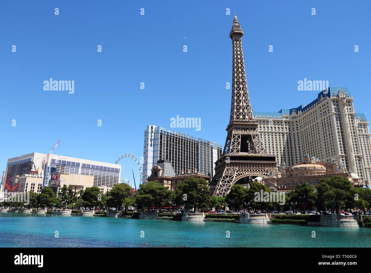 LAS VEGAS, USA - APRIL 14, 2014: People visit Paris Las Vegas casino hotel in Las Vegas. The hotel is among 30 largest hotels in the world with 2,916  Stock Photo