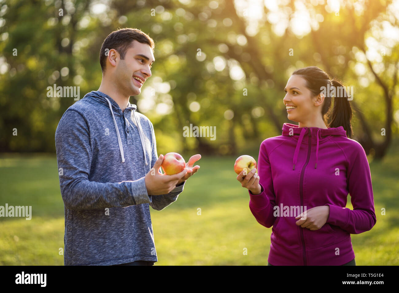 Young athlete eating fruit at sport hi-res stock photography and images ...