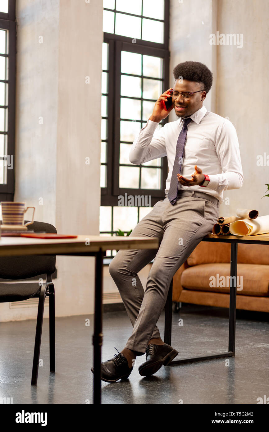 Handsome good looking man making a call Stock Photo