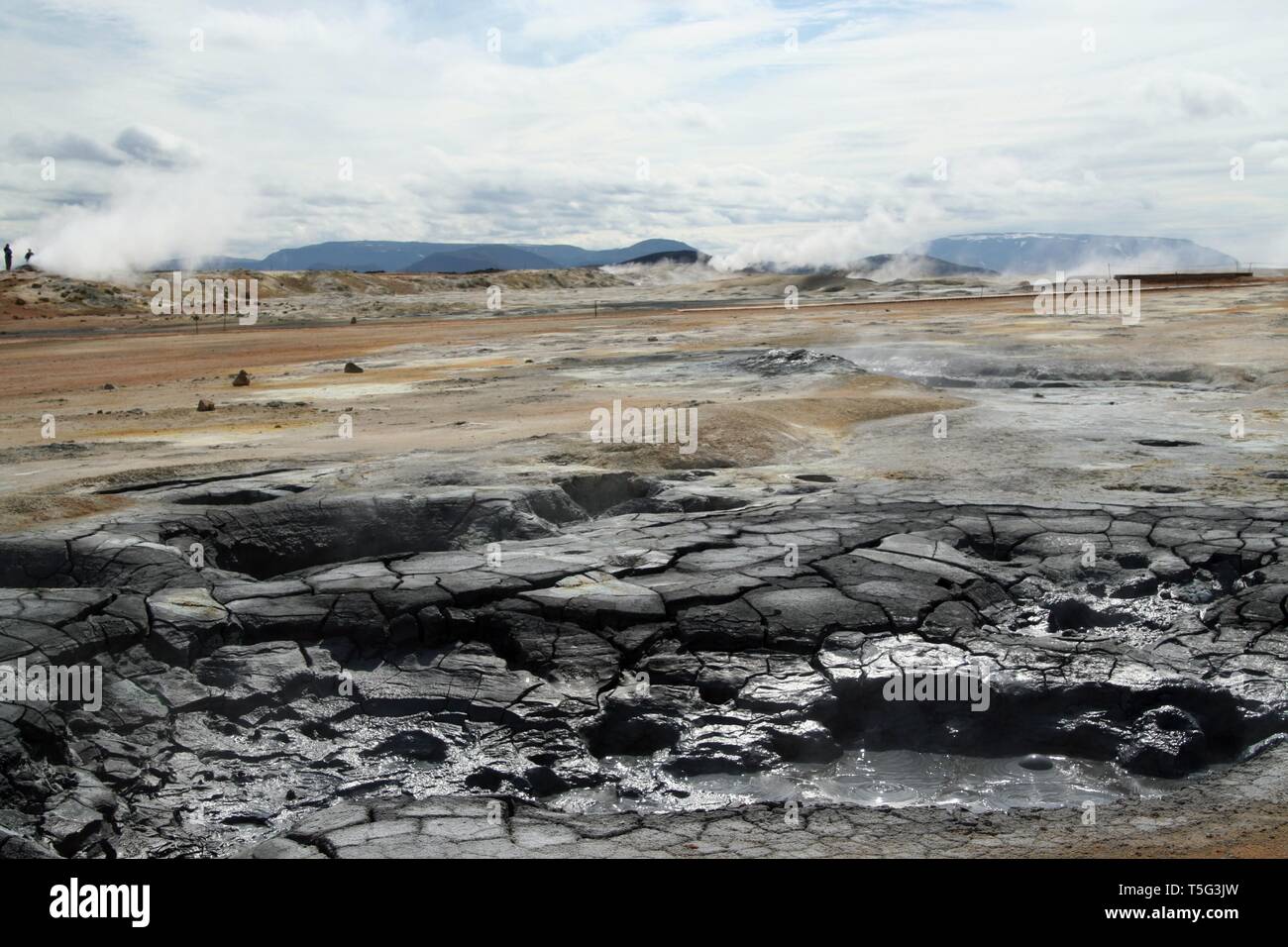 Seltun / Krysuvik (Krýsuvík) - Bubbling hot mud pot on steaming geothermal field with deposits of sulfates Stock Photo