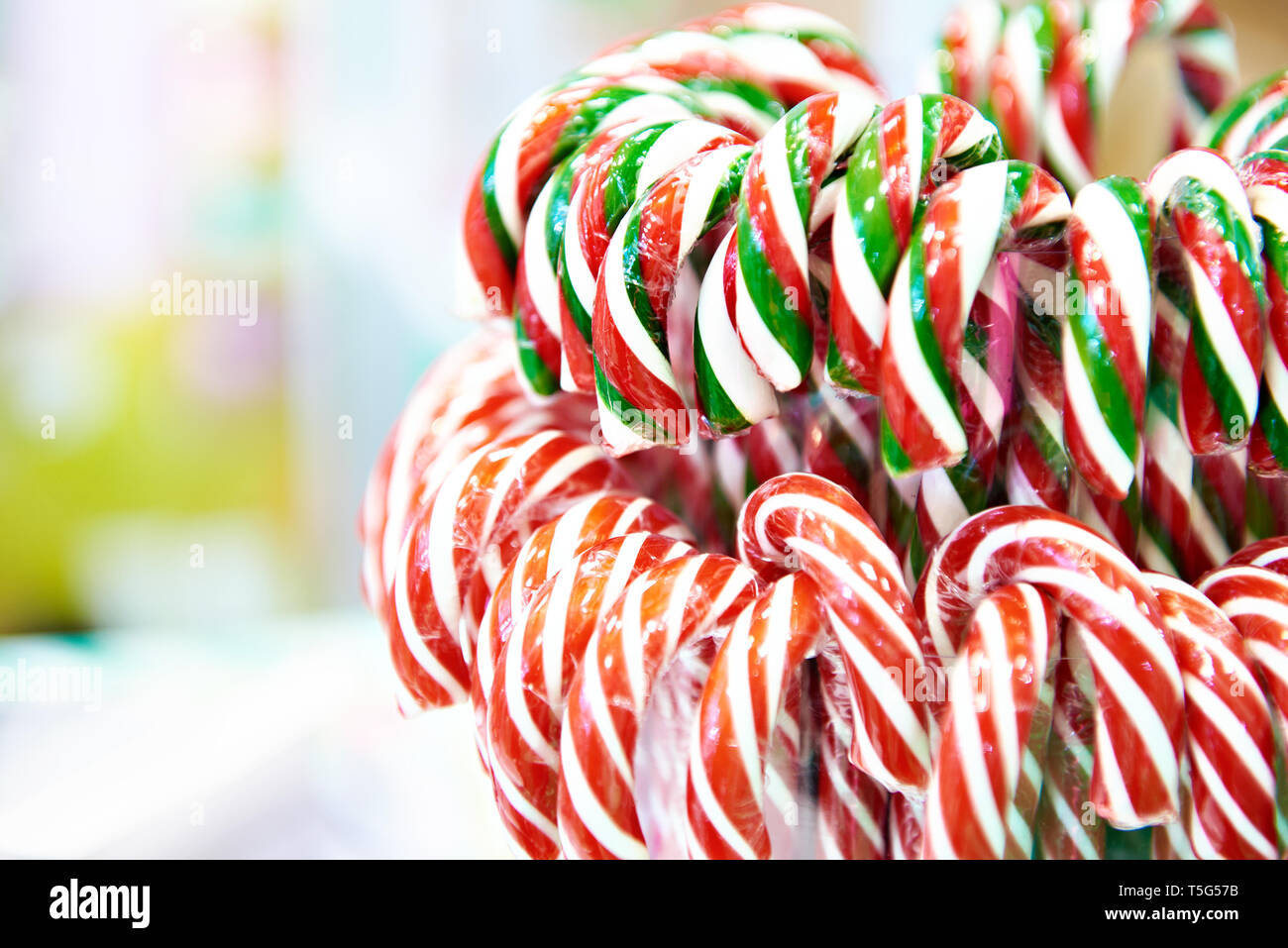 Christmas candy canes in store Stock Photo