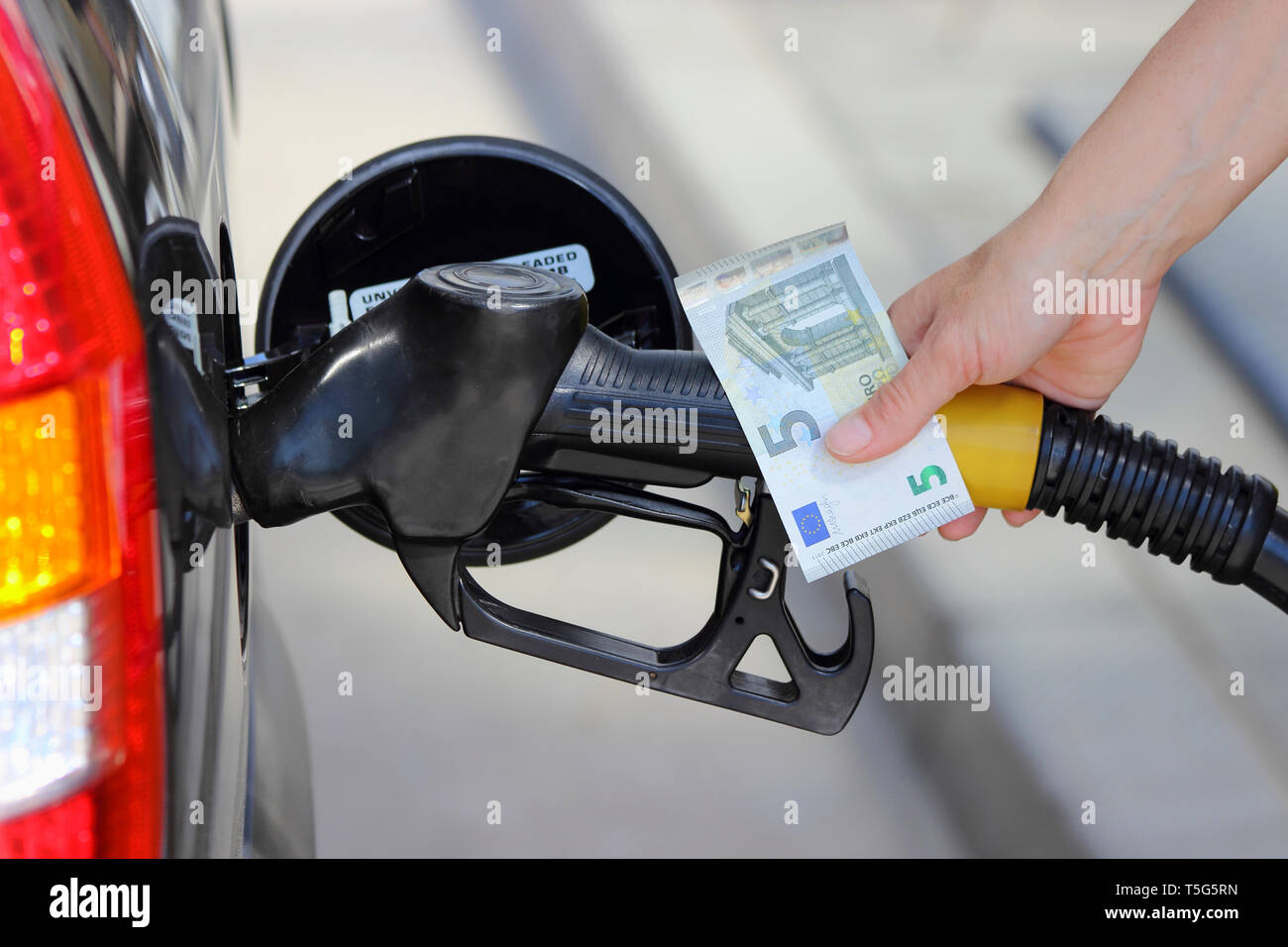 Refueling stop - Rising or falling prices at the gas station Stock Photo