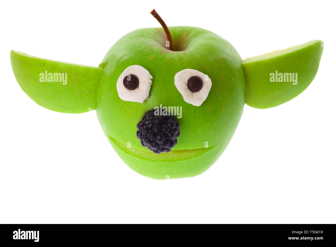 Funny apple yoda, isolated on a white background Stock Photo