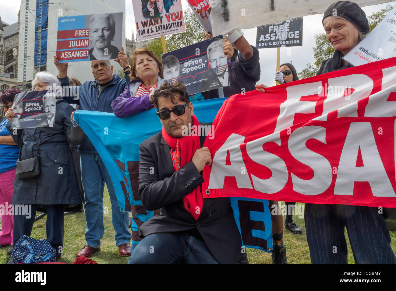 London Uk 24th Apr 2019 Afshin Rattansi From Rt S Going Underground Programme Poses With Protesters In Parliament Square Calling For The Release Of Julian Assange They Say He Should Not Be Extradited
