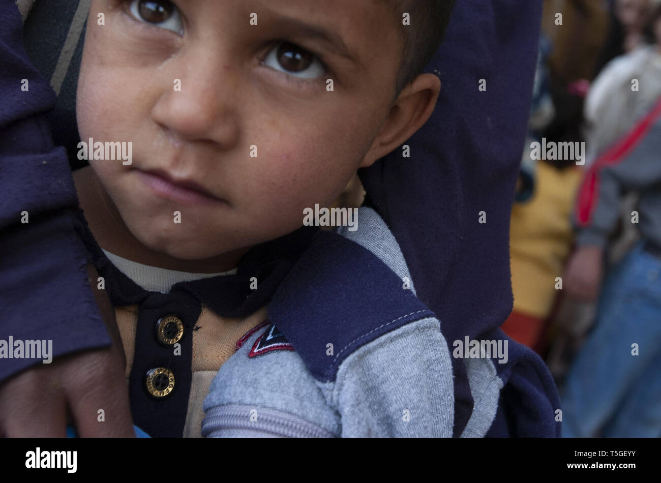 Baghdad, Baghdad, Iraq. 12th Jan, 2006. An Iraqi boy at a medical clinic with Iraq soldiers and American soldiers from 2nd Battalion, 22nd Infantry Regiment near Abu Ghair, Iraq, January 12, 2006. Credit: Bill Putnam/ZUMA Wire/Alamy Live News Stock Photo