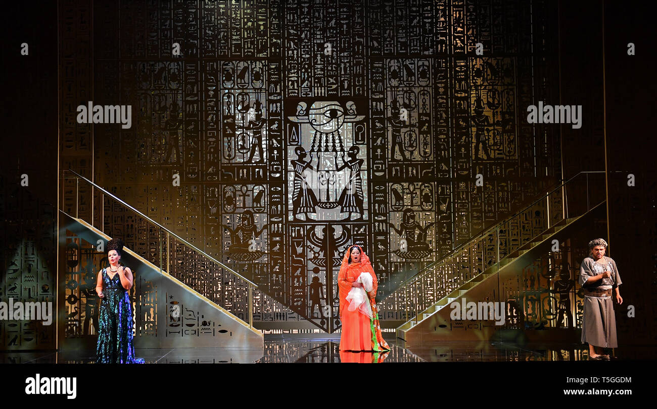 Erfurt, Germany. 24th Apr, 2019. Eliska Weissova (l) as Amneris, Michelle Bradley (M) as Aida and Mikhail Agafonov (r) as Radames rehearse a scene from Giuseppe Verdi's opera 'Aida' on the stage of the Theater Erfurt. The production by Andre Heller-Lopes will premiere on 27 April 2019. It is the penultimate production of the current season of the Erfurt Theatre. Credit: Martin Schutt/dpa-Zentralbild/dpa/Alamy Live News Stock Photo