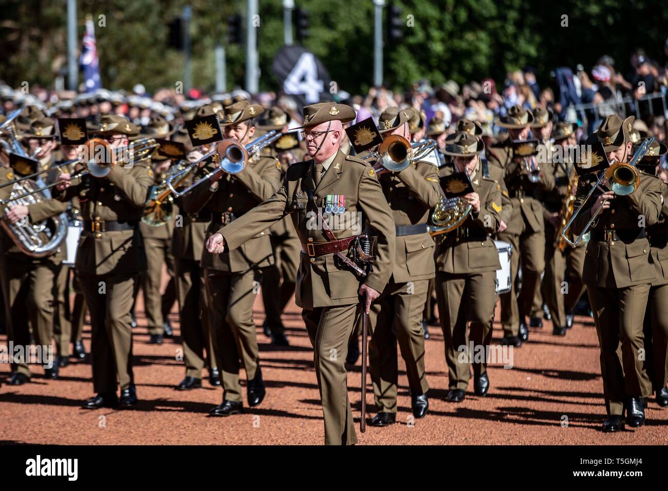 Canberra, Australia. 25th Apr, 2019. A military band march during an ANZAC  Day ceremony at Australian