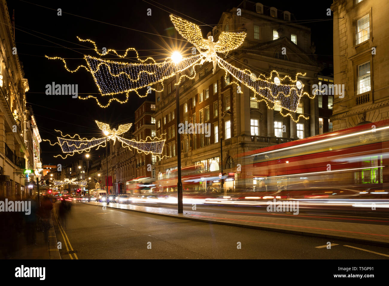 United Kingdom, England, London, Piccadilly Circus, Bus, Christmas illumination at night Stock Photo