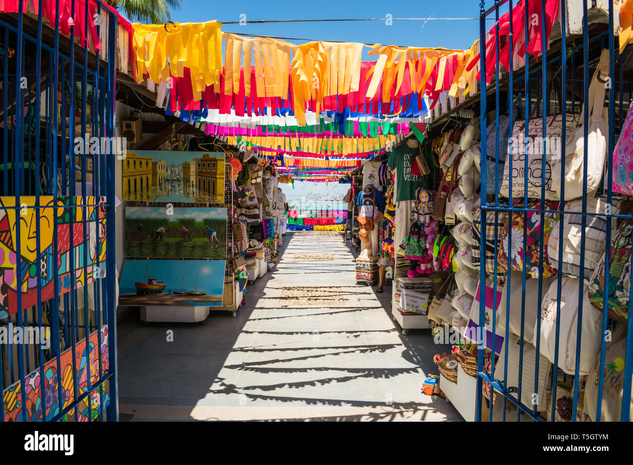 Olinda, Brazil - Circa April 2019: A view of the Handicraft's Market in Olinda's historic center, cityscape of Recife in the background Stock Photo