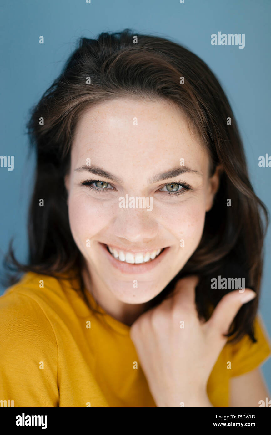 Portrait of a pretty woman, smiling happily Stock Photo