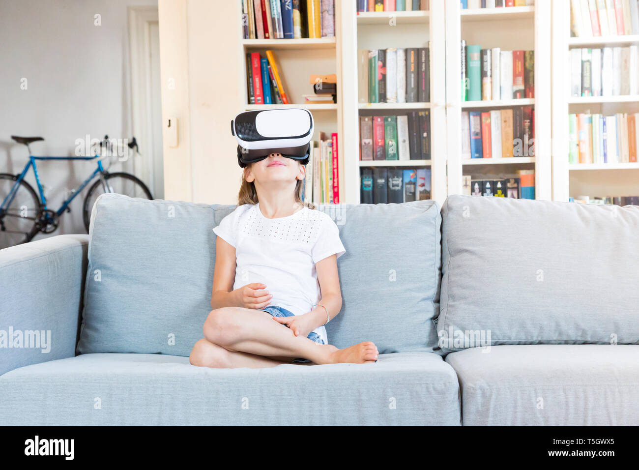 Girl using virtual reality glasses Stock Photo