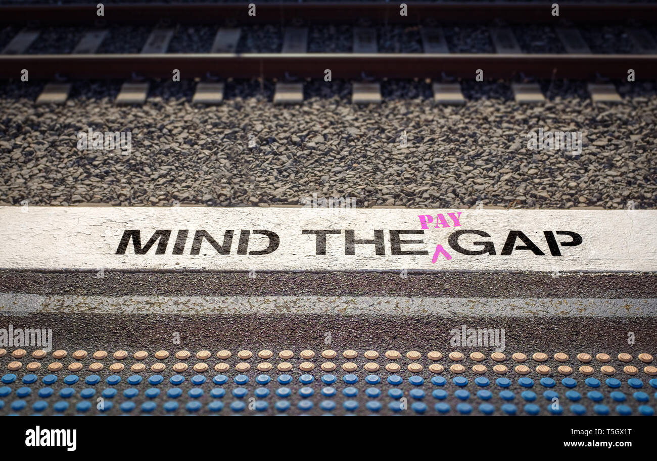 Gender pay gap, Mind the pay gap graffiti in pink, Gender pay equality concept – Image Stock Photo