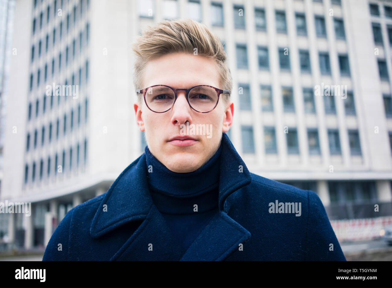 Serious young man in hi-res stock photography and images - Alamy