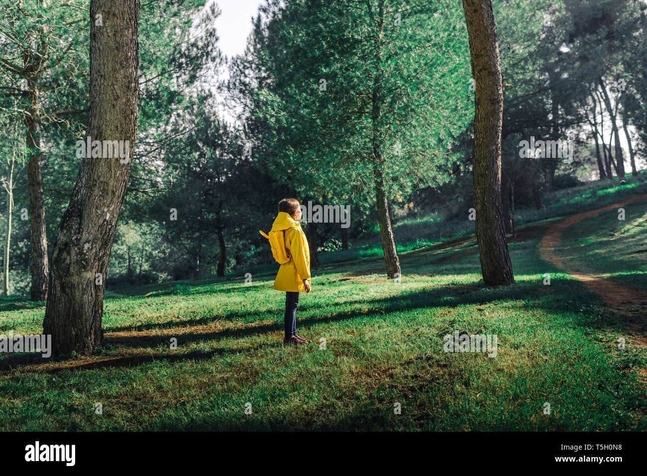Raincoat yellow hi-res stock photography and images - Alamy