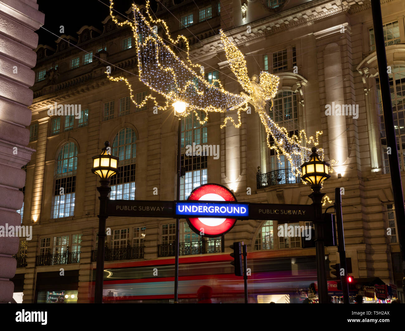 United Kingdom, England, London, Piccadilly Circus, Underground, Bus, Christmas illumination at night Stock Photo
