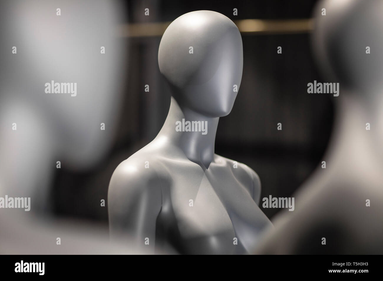Faceless grey female display dummy, partial view Stock Photo