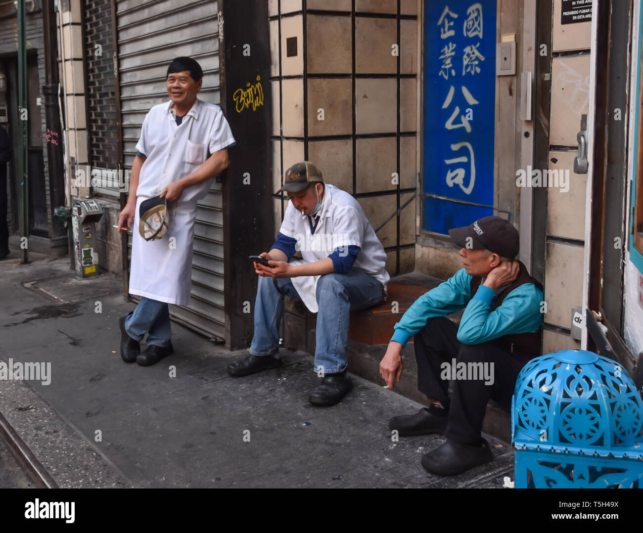 Smoke break in Chinatown Stock Photo Alamy