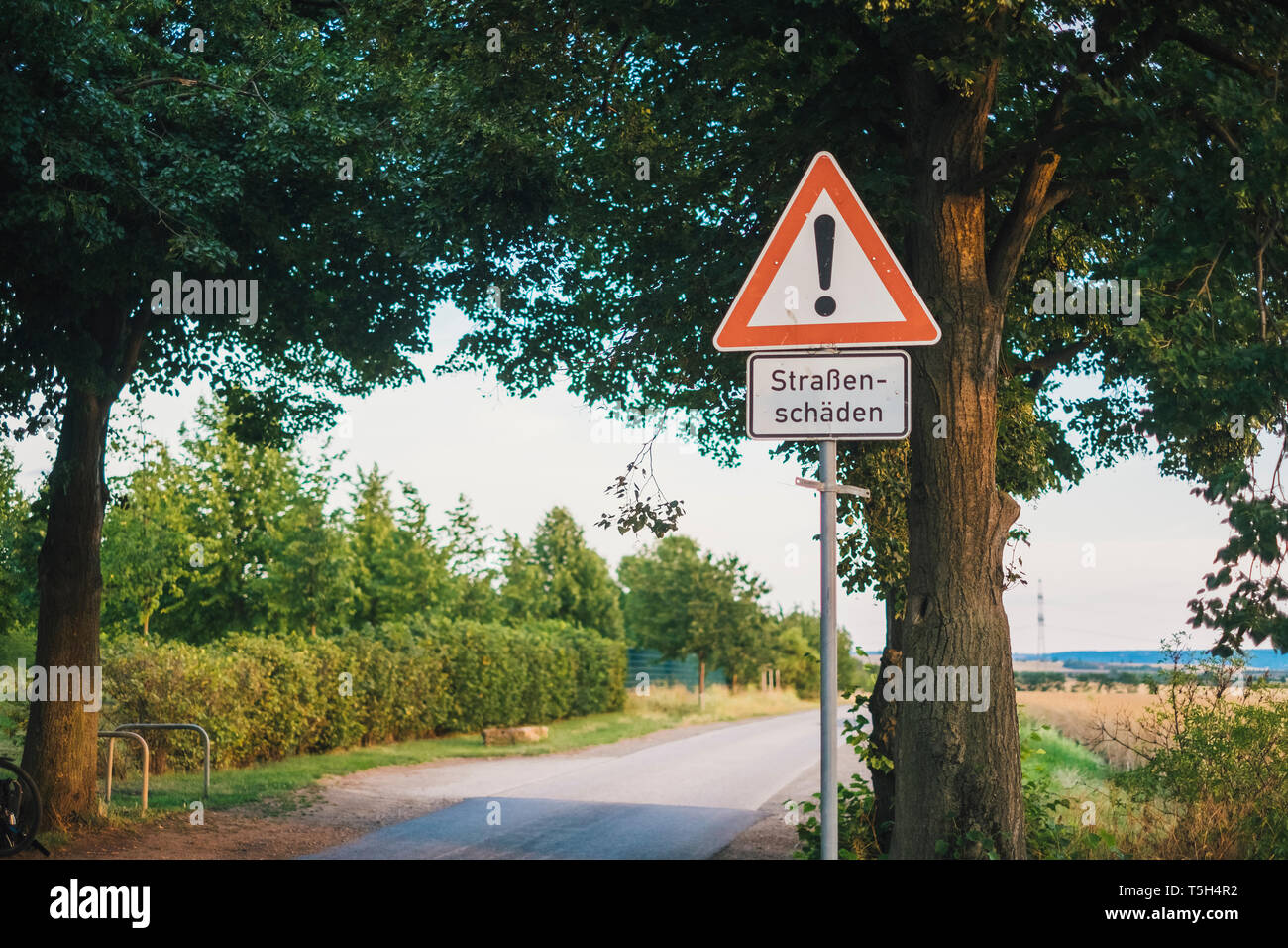 Germany, warning sign 'roadway damages' Stock Photo