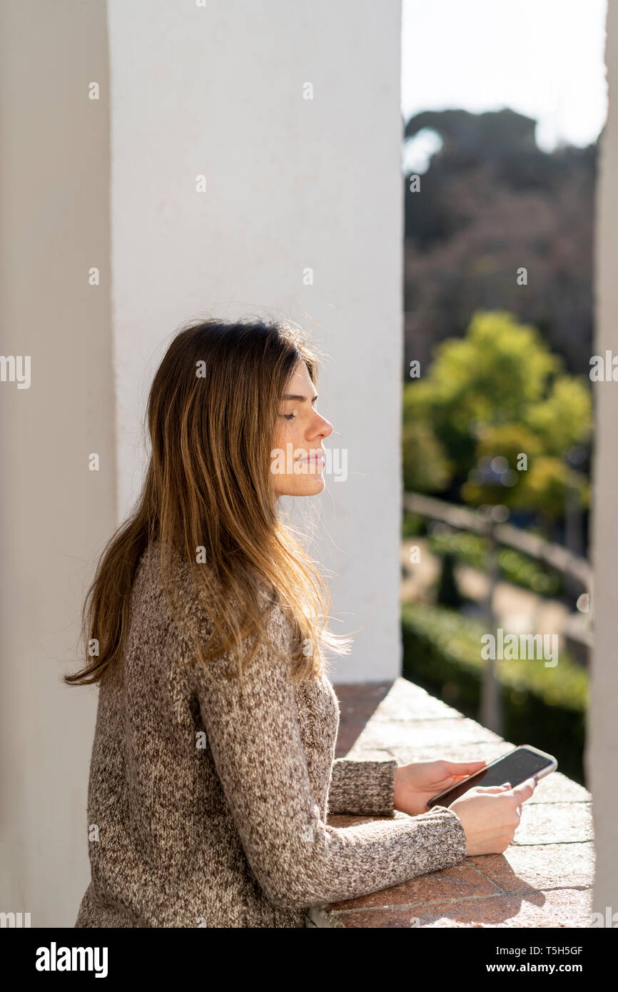 Relaxed woman outdoors hi-res stock photography and images - Alamy