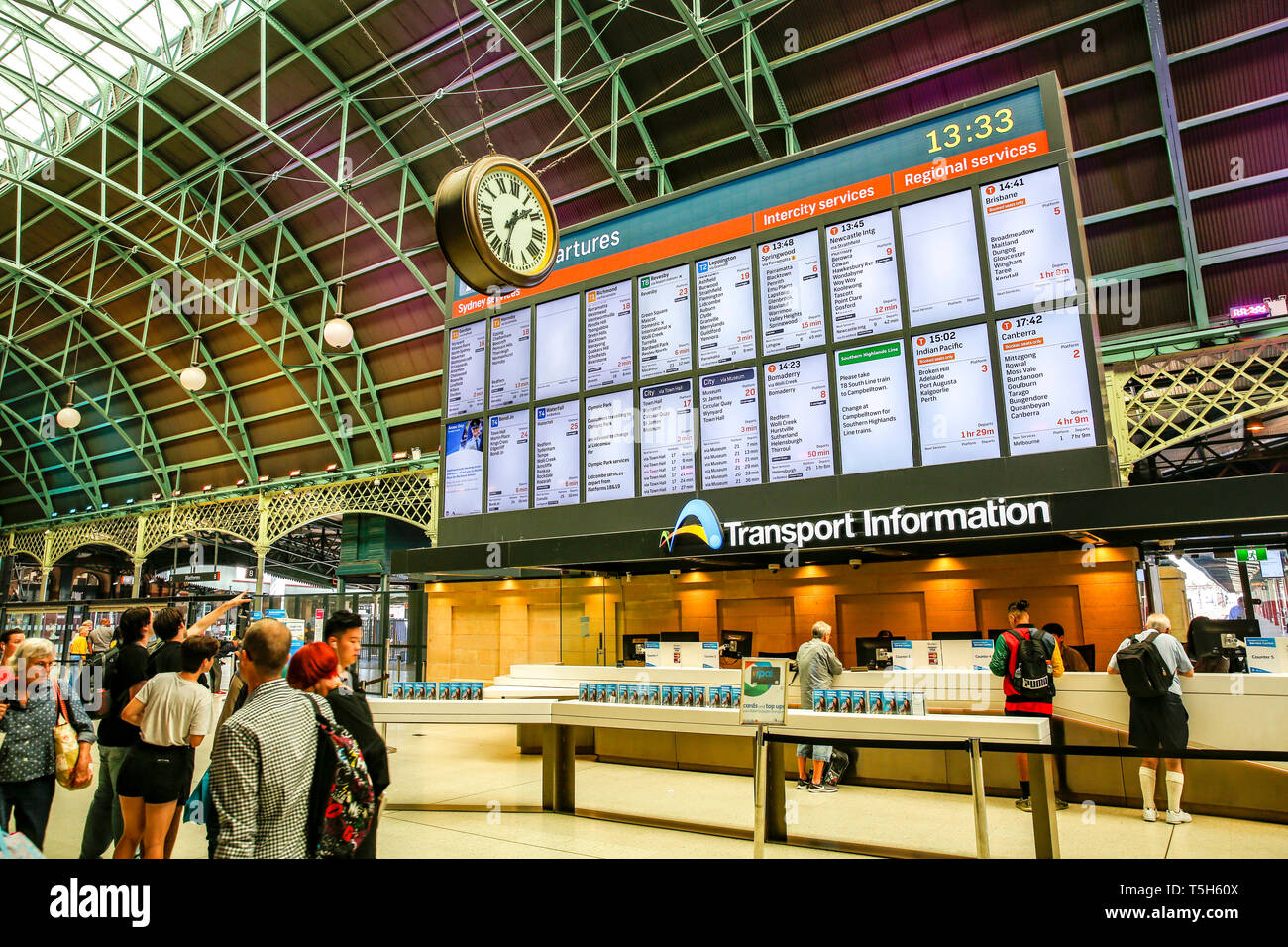 Central station, railway terminus station in Sydney city centre,New South Wales Australia, with station clock and transport information board Stock Photo
