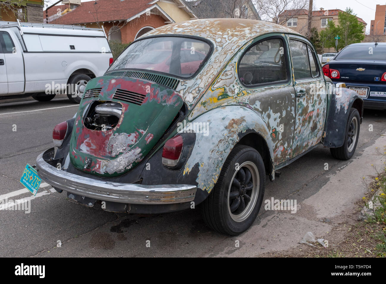 rusted, unpainted Volkswagen Bug or VW Beetle Stock Photo