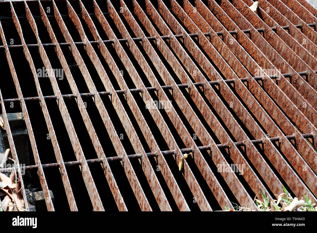 Gutters drain grate, drain cover. Road drains sewer cover. iron grate