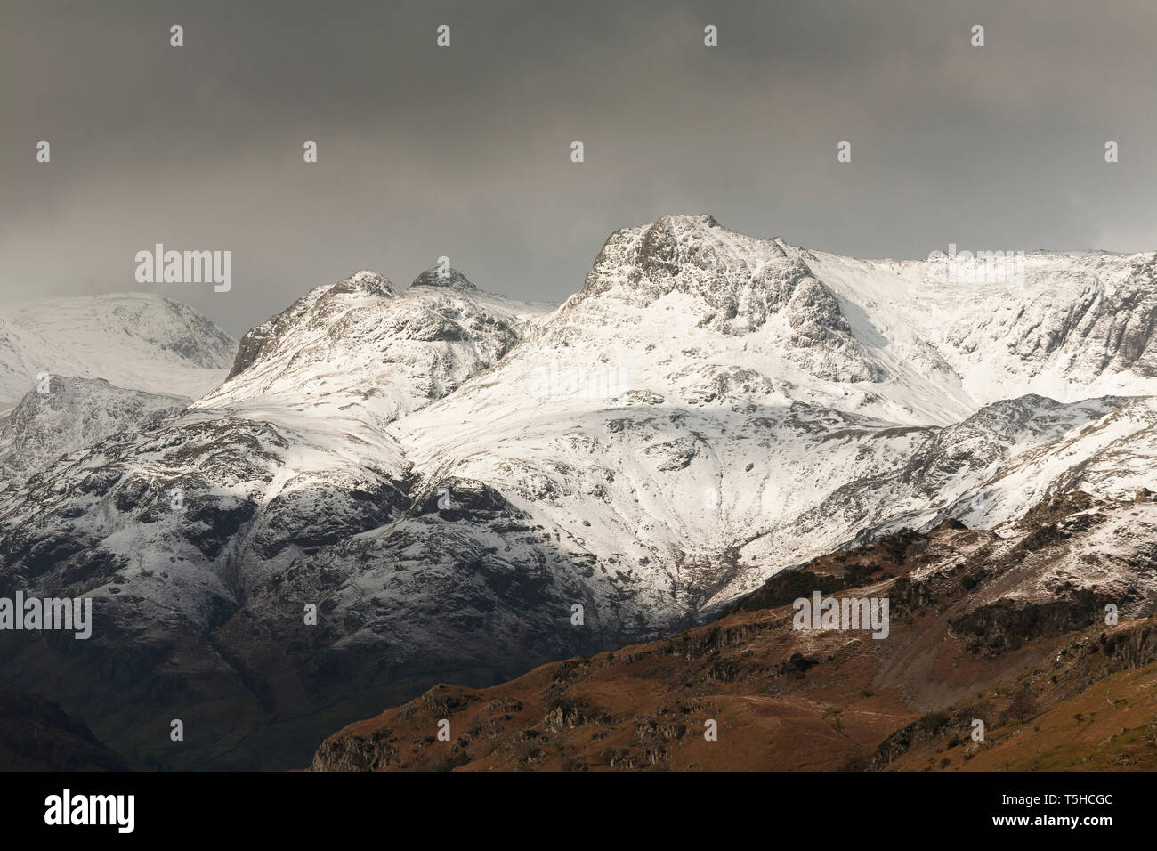 Langdale Pikes in winter storm Stock Photo