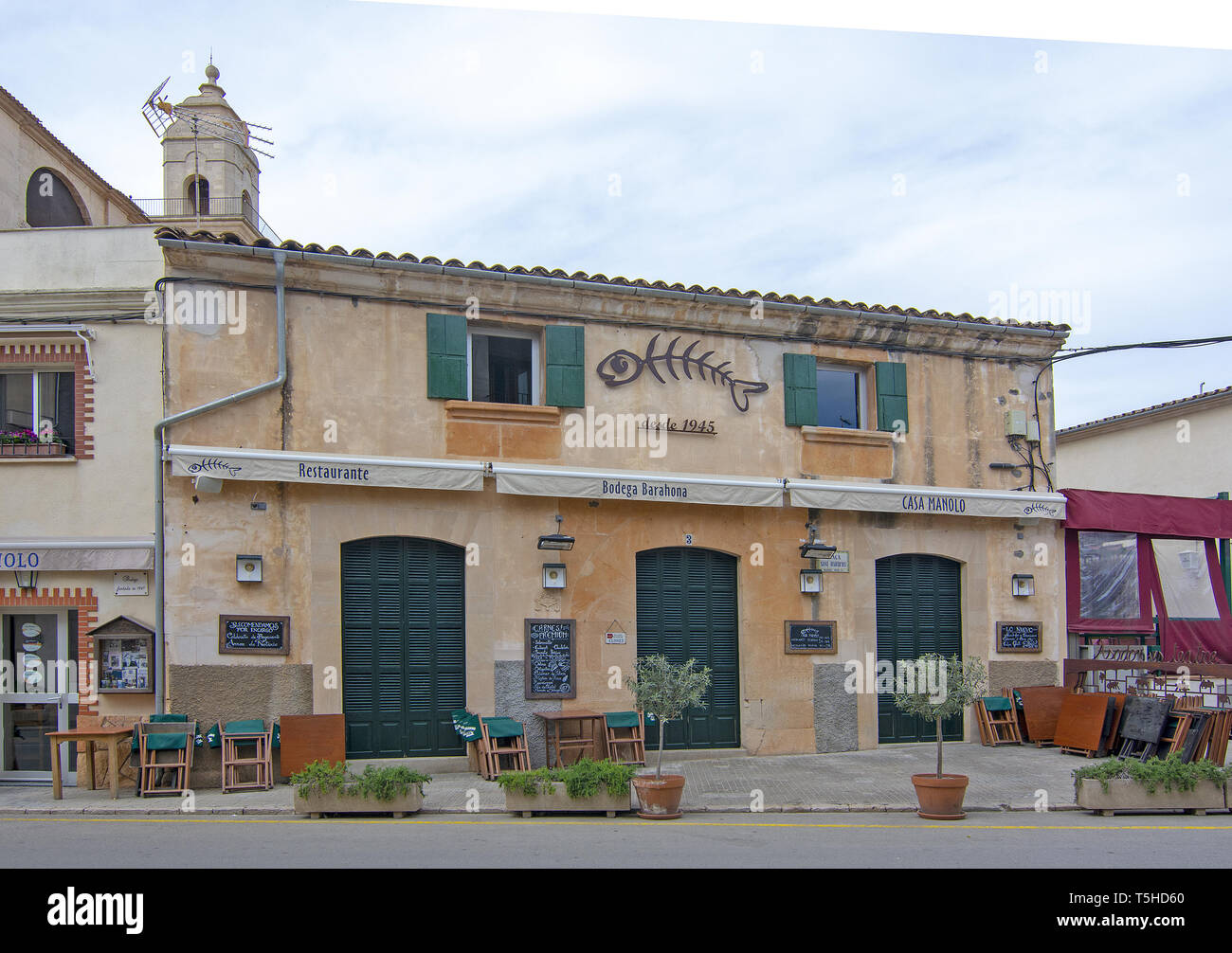 SES SALINES, MALLORCA, SPAIN - APRIL 15, 2019: Bodega Barahona front street view in central city on an overcast day in the beginning of tourist season Stock Photo