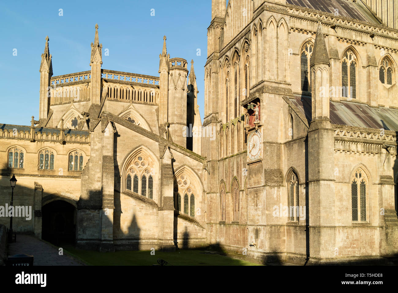 North side of Wells Cathedral showing  clock and part of Chapter House Stock Photo