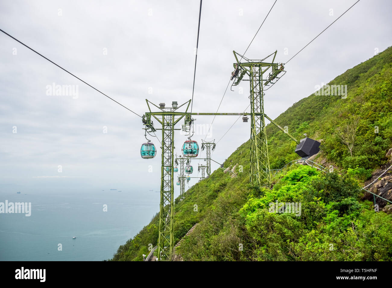 Tourists taking cable cars back and forth between The Waterfront and ...