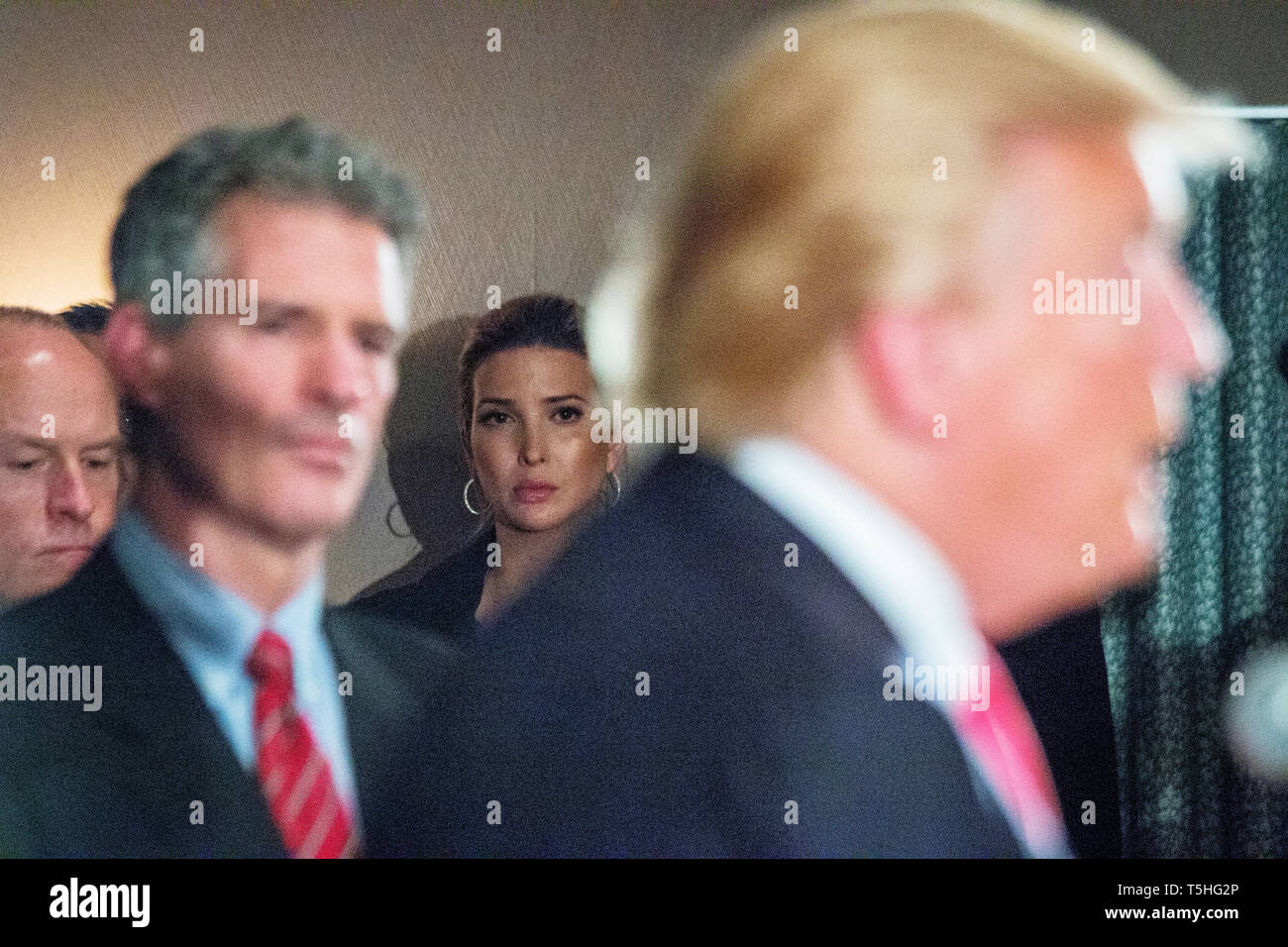 Ivanka Trump listens in the background as her father, the republican Presidential candidate Donald J. Trump hosts a press conference in Milford, NH, where he announced the endorsement from former Massachussetts Senator Scott Brown (left). Stock Photo