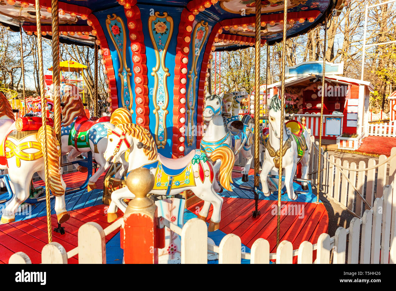 Children in colourful carousel traditional hi-res stock photography and ...