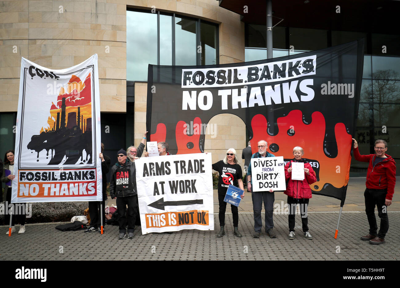 Anti-fossil fuel protesters demonstrate outside the the Royal Bank of Scotland headquarters in Edinburgh. Stock Photo