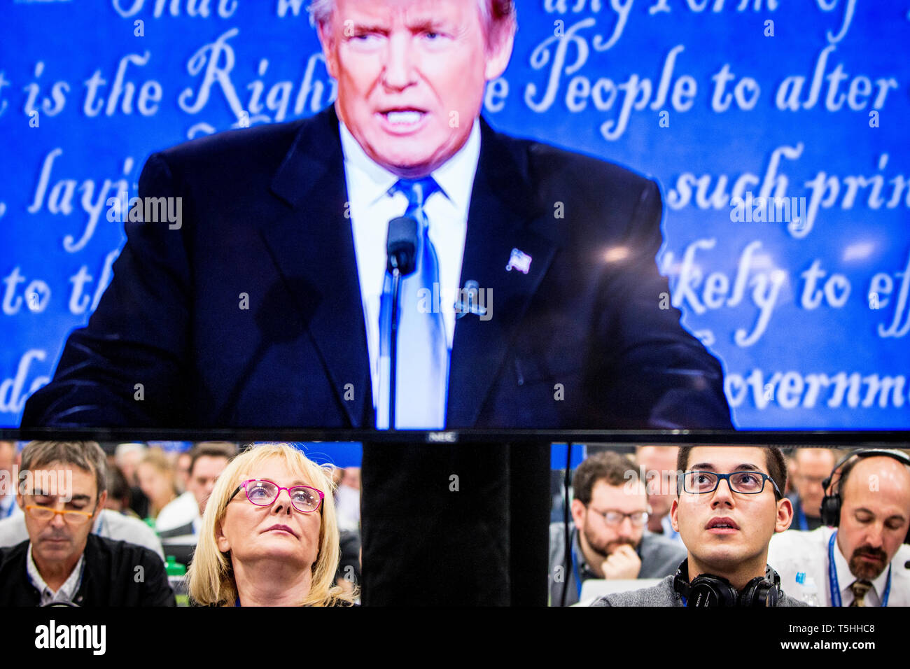 Reporters listen to Donald Trump at the debate. The Democrate and Republican nominees for US President, Hillary Rodham Clinton and Donald John Trump, met on Sep. 26th for the first head to head Presidential Debate at the Hofstra University in Long Island. Stock Photo