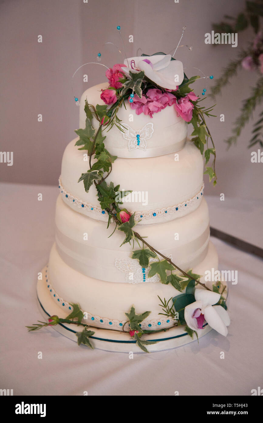 Wedding cake, three tiered wedding cake decorated with beautiful pink ...