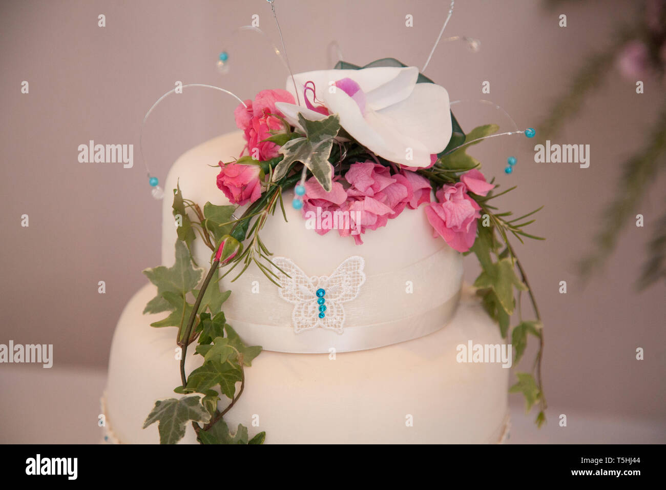 Wedding cake, three tiered wedding cake decorated with beautiful pink ...