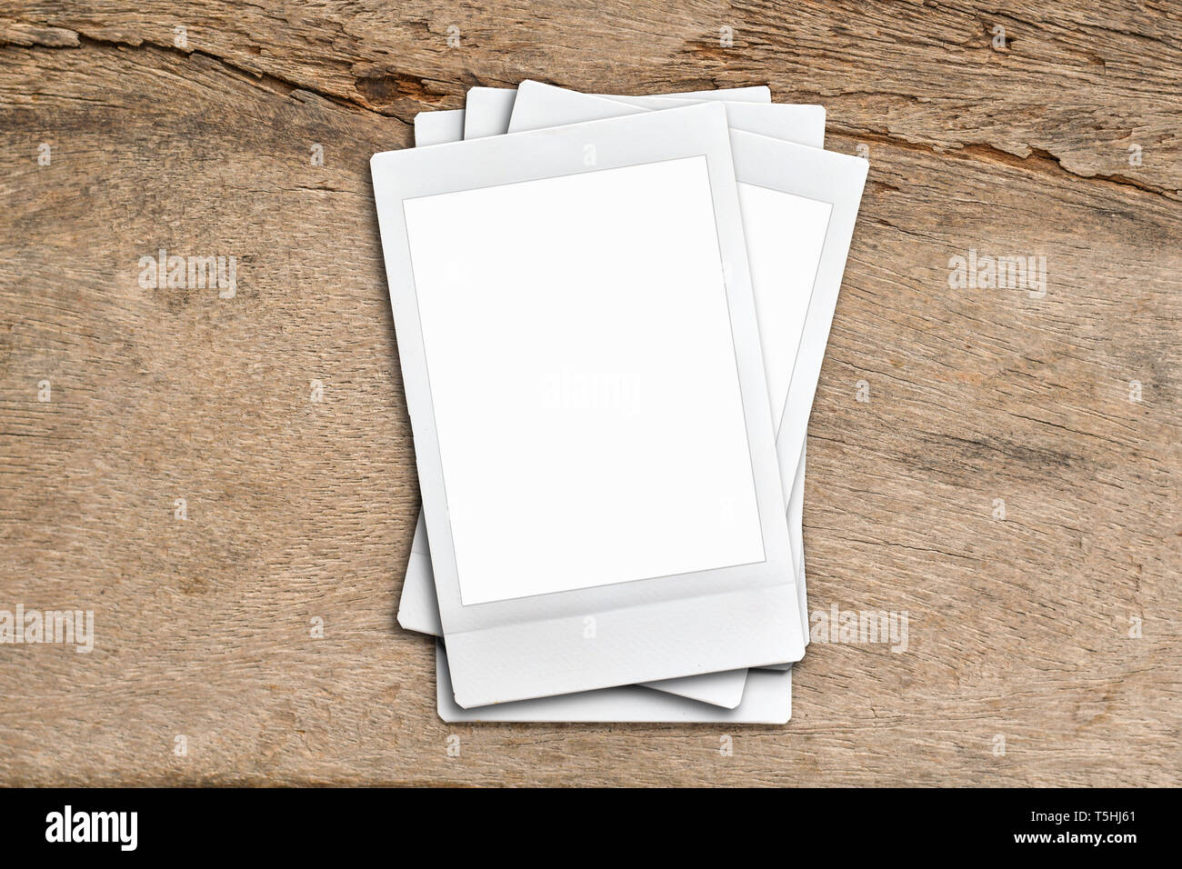 top view blank paper photo frame on wood texture background clipping path Stock Photo