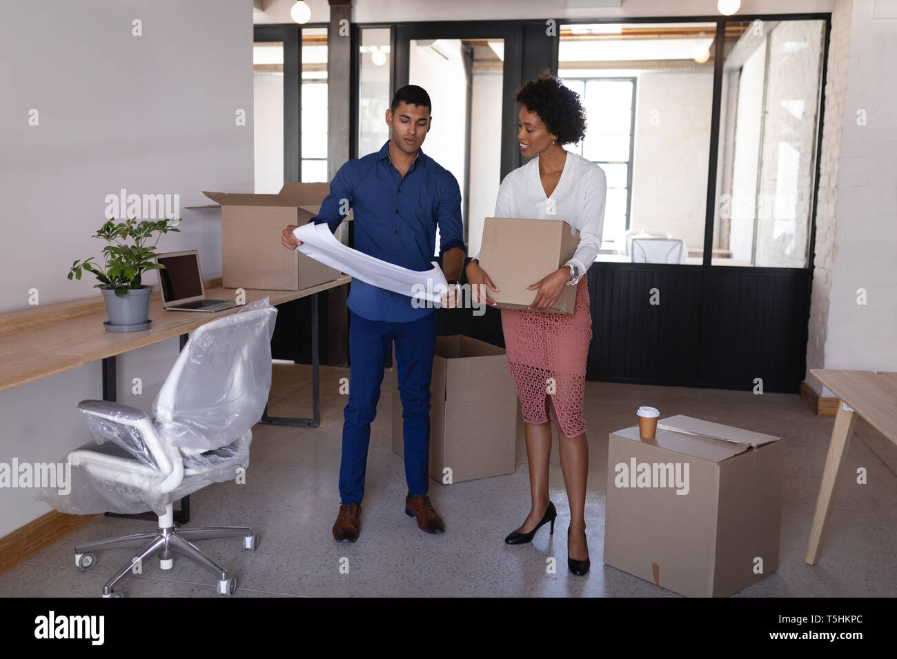 Business people move in in a new office Stock Photo