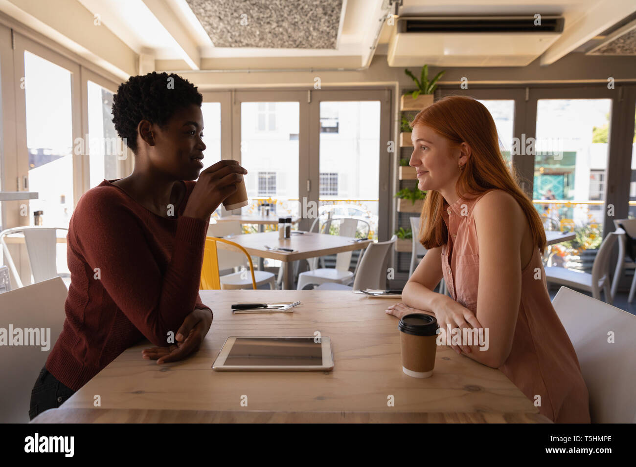 Black women in cafe having coffee hi-res stock photography and images ...