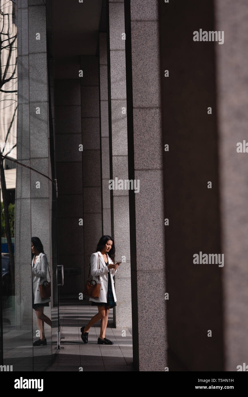 Beautiful asian woman walking hi-res stock photography and images - Alamy